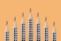 Graphite pencils with the fine tip on an ocher background Royalty Free Stock Photo