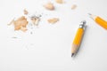 Graphite pencils and shavings on white background Royalty Free Stock Photo