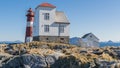 Grasoyane Lighthouse with aalesund from behind at Ulsteinvik Royalty Free Stock Photo