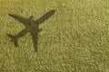 Grass with airplane shadow