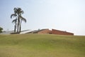 Grass background. Masonry constructions in a luxury resort and green nature. Winter Royalty Free Stock Photo