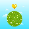 Grass Ball With Yellow Balloon Royalty Free Stock Photo