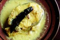 Grass carp cooked in mustard sauce