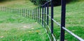 Grass with curved metal railing