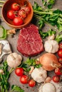 Grass fed beef steak from the tenderloin.Fresh meat preparation. Raw meat seasoning.Portioned filet mignon with spices and Royalty Free Stock Photo