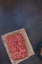 Grass fed raw angus ground beef on parchment paper Royalty Free Stock Photo