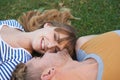 Grass field, love and portrait of happy woman, couple or people relax for outdoor sunshine, wellness or romantic date