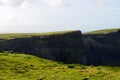 Grass Fields Surrounding the Cliff`s of Moher