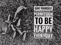 Grass and flowers with phrase GIVE YOURSELF PERMISSION TO BE HAPPY EVERYDAY