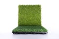 Grass mat on white background. Artificial turf tile background. Royalty Free Stock Photo