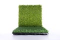 Grass mat on white background. Artificial turf tile background. Object and background concept Royalty Free Stock Photo