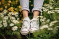 woman sneakers flowers grass green fashion female lifestyle relax spring white. Generative AI. Royalty Free Stock Photo