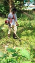 Grassland cutt worker Royalty Free Stock Photo