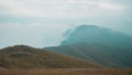 Grassland on mountain ridge covered in clouds on Wugong Mountain in Jiangxi, China Royalty Free Stock Photo