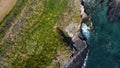 Grassy cliffs on the Atlantic coast. Landscape of Ireland from a height. Seaside rocks Royalty Free Stock Photo