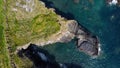 Grassy cliffs on the Atlantic Ocean coast. Landscape of Ireland from a height. Seaside rocks. Drone photo. View from above Royalty Free Stock Photo