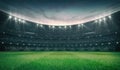 Empty green grass field and illuminated outdoor stadium with fans, front field view Royalty Free Stock Photo