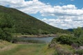 Grassy hill overlooking Vega Reservoir in Western Colorado