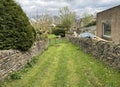 Grassy path, leading from, Baxter Wood, in Glusburn, Yorkshire, UK