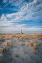 Grassy sand dunes and Fire Island Lighthouse, Fire Island, New York Royalty Free Stock Photo