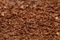 Grated 100 percent cacao dark chocolate background