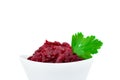 Grated beets. Fresh beet salad in a white bowl isolated on a white background. The concept of healthy food, diet, fresh vegetables Royalty Free Stock Photo