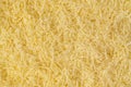 Grated cheese background texture. yellow shredded  cheese. Close up top view Royalty Free Stock Photo