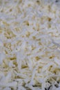 grated cheese in large quantities at home