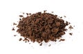 Grated chocolate. Pile of ground chocolate isolated on white background, closeup