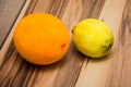 Grated lemon and orange placed on the wooden table Royalty Free Stock Photo