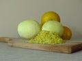 Grated lemon skin. Peeled lemons. Finely grate lemon zest. Juicy ripe yellow lemons.