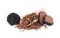 Grated Truffle on a wooden spoon. Fresh black truffles isolated on a white background. Delicacy exclusive truffle