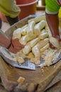 Grated yucca being prepared for bread in a Siona village in the Cuyabeno Wildlife Reserve, Ecuador