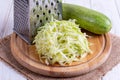 Grated zucchini with grater