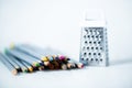 Grater with colored pencils Royalty Free Stock Photo