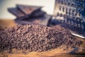 Grater and grated chocolate closeup Royalty Free Stock Photo