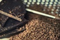 Grater and grated chocolate closeup Royalty Free Stock Photo