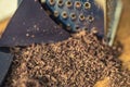 Grater and grated chocolate closeup