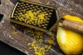 Grater peel and lemon zest Ready to Cook, vertical image. top view Royalty Free Stock Photo