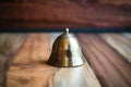 a gratitude bell on a wooden surface