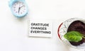 Gratitude changes everything. The text label in the notebook. Expression of politeness, satisfaction, positive assessment of