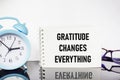 Gratitude changes everything. The text label in the notebook. Expression of politeness, satisfaction, positive assessment of