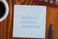 Gratitude changes everything written on a note Royalty Free Stock Photo