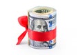 roll of dollars bill banknotes with red ribbon. Bucks. Bribe. Money love silence. In bucks we trust