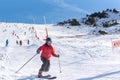 Men ride a telemark in Sunny Day in Grandvalira Ski Station in Andorra.