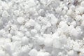 Graupel, snow pellets or soft hail texture, background. Form of precipitation, macro