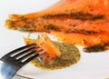 Gravadlax dipped in dill sauce