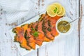 Gravadlax - Nordic dish of thinly sliced raw salmon cured in salt, sugar and dill Royalty Free Stock Photo