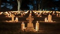 Grave candles illuminate cemetery at night for All Saints Day memoria. Concept Cemetery Decor, All