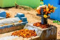 Grave decorated with flowers for All Saints Day, Guatemala